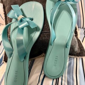 Guess Women's Tutu Bow Flip Flops Women's Shoes. These are NWOT.